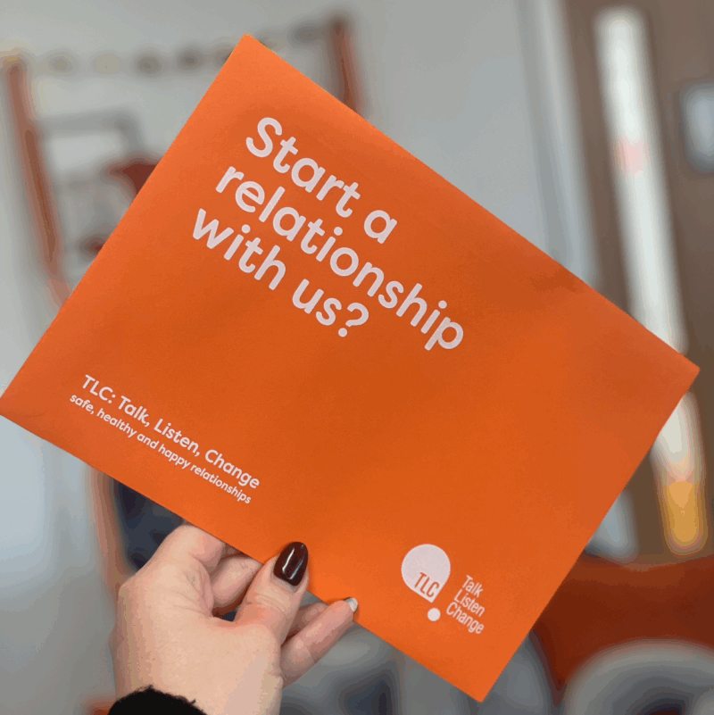 envelope that reads 'start a relationship with us' orange colour.
